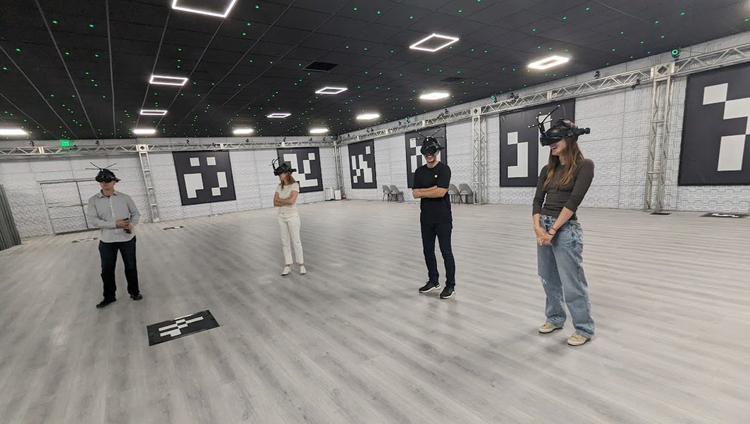 People participating in a multi-user Holodeck session